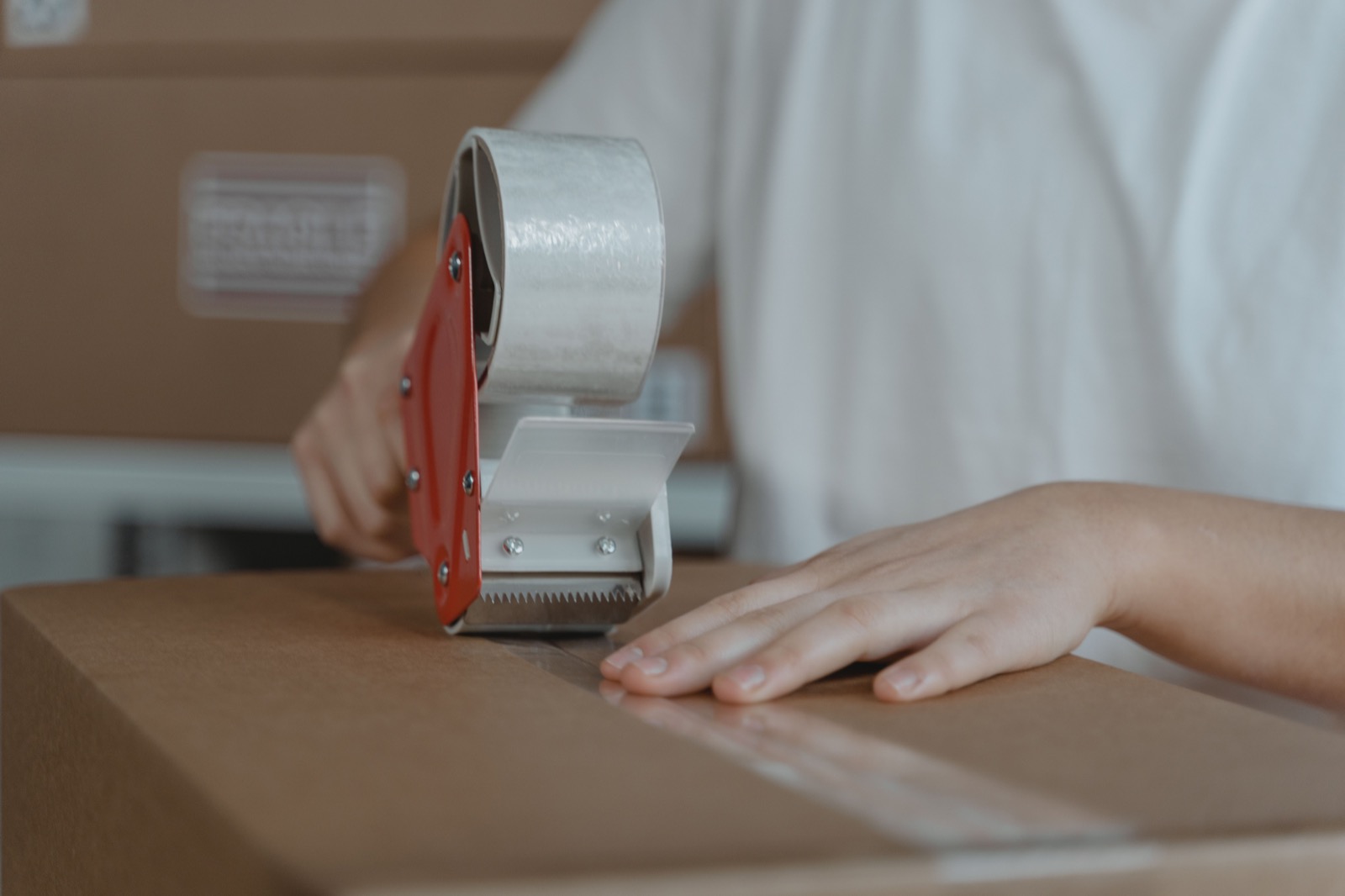 Packing an order for dispatch, illustrative stock photograph
